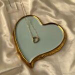 heart outline pendant.