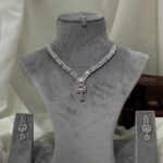ight Pink and American Diamond (AD) Necklace Set with Maang Tikka and Earrings