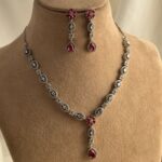 American Diamond Ruby and Silver Alloy Necklace and Earring Set.